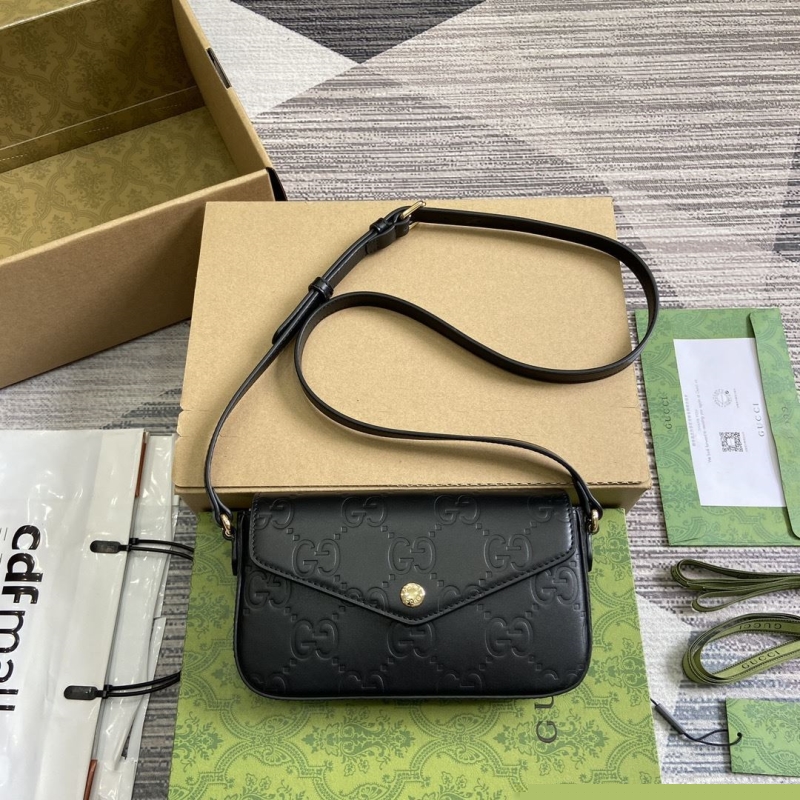 G*u*i satchel bags